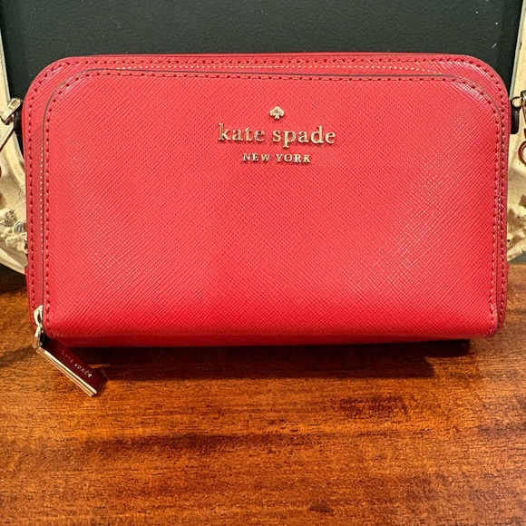 kate spade Handbags - Kate Spade Vibrant Red Zip-Around Wallet